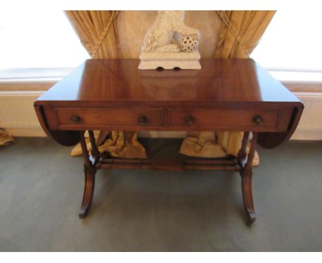 A Regency style two drawer sofa table with twin column supports to stretcher, 72.5cm x 102cm x 61cm 