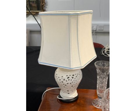 A pair of modern ceramic pierced vase form lamp bases with white shades, 54cm tall, Collectors Electrical Item, see Informati