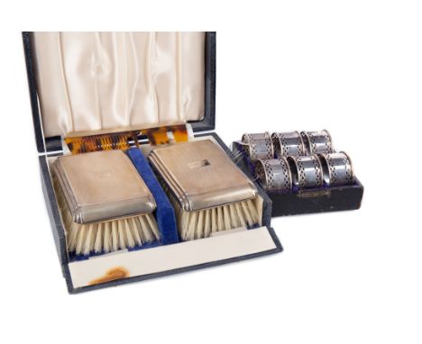 ELIZABETH II SILVER BACKED BRUSH SET, maker Deakin &amp; Francis, Birmingham 1973, comprising two clothes brushes and a comb,