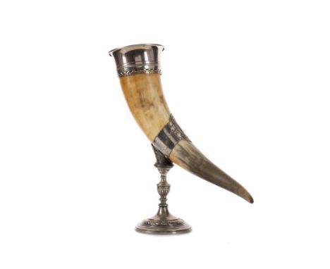 LATE 19TH CENTURY SILVER PLATE MOUNTED HORN CENTREPIECE, the mounts chased and engraved with foliage and strapwork, raised on