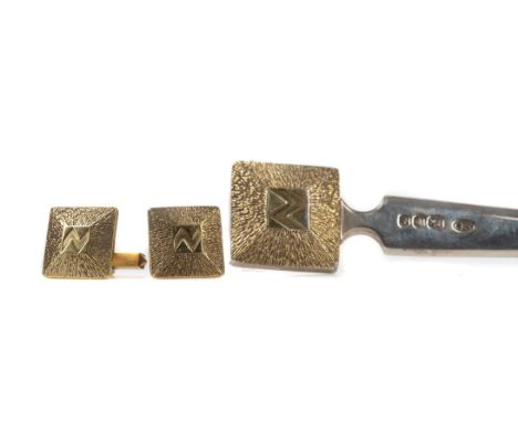 PAIR OF STUART DEVLIN SILVER GILT CUFFLINKS, London 1981, of square form, textured with central rune motif, 2.6cm x 2.6cm, al