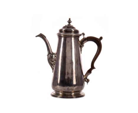 GEORGE II SILVER COFFEE POT, maker William Williams I, London 1743, of footed tapered form, the hinged domed cover with urn f