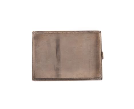 GEORGE V SILVER CIGARETTE CASE, maker Cohen &amp; Charles, London 1932, of oblong form, the engine turned exterior with scrol