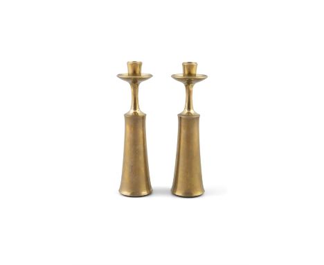 JENS QUISTGAARD (1919 - 2008)A pair of brass candle sticks/vases by Jens Quistgaard with maker's stamp. Dansk Designs, Denmar