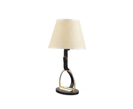 JACQUES ADNET (1900-1984) 'Stirrup' lamp by Jacques Adnet in black leather and brass with a parchment shade. c.1960's. 50cm(h