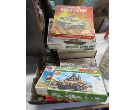 A box of model vehicles, predominantly military, to include boxed Aurora and Midori examples