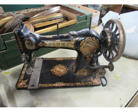 A Jones' Sewing machine, together with a set of Libra Scales and a set of postal scales and weights