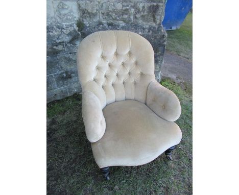 A 19th century upholstered nursing chair, with button back