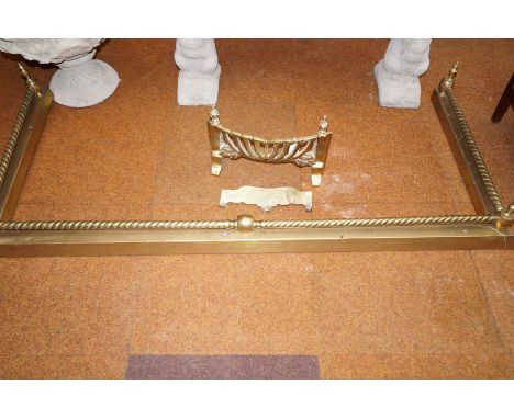 Brass fender together with a brass fire grate