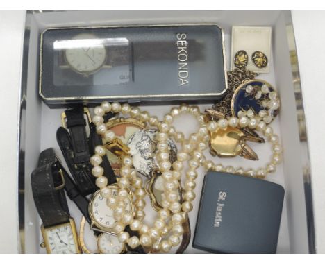 A small selection of costume jewellery including wrist watches, double string of pearls, vintage rolled gold and enamel wrist