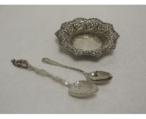 A small Victorian silver trinket dish having repousse decoration and frilled rim, Sheffield 1895, Fenton Brothers and two HM 