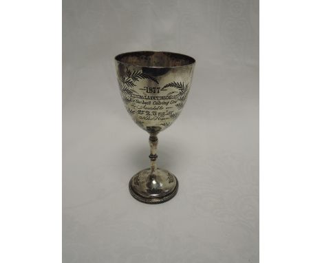 A Victorian silver presentation goblet having engraved fern and grass decoration and presentation inscription: For the Best C