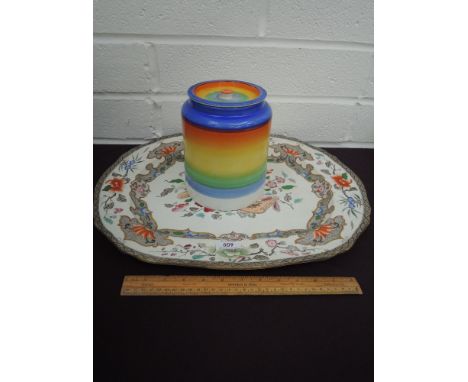 A 1920's Grays pottery lidded pot having rainbow stripe decoration and a Victorian meat platter having chinoiserie decoration