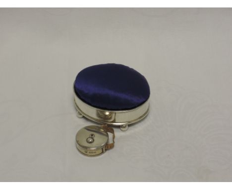 A silver and blue silk trinket box/pin cushion of plain form having bun feet, Chester 1907, Colen Hewer Cheshire, and a Victo