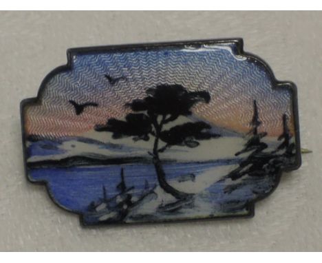 A Norwegian white metal and enamel brooch by Ivor Holth of canted rectangular form having scenic decoration, stamped Sterling