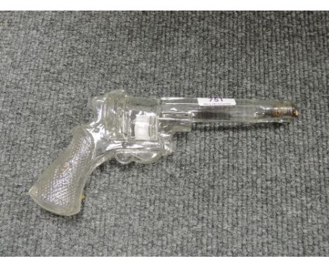 A glass decanter modelled as Colt pistol