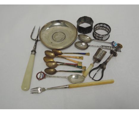 A small selection of white metal and HM silver including bone handled pickle fork, napkin rings, trinket dish with coin to ce