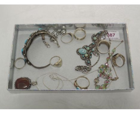 A selection of white metal jewellery including bangle stamped Sterling having turquoise decoration, rings, agate pendant and 