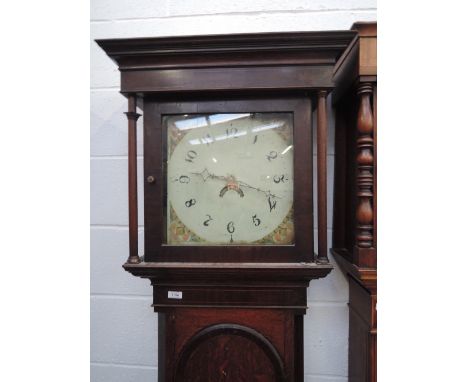 A late 18th century oak and mahogany longcase clock having square pillar hood and painted dial containing 30 hour movement on