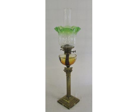 Brass paraffin lamp with green glass shade
