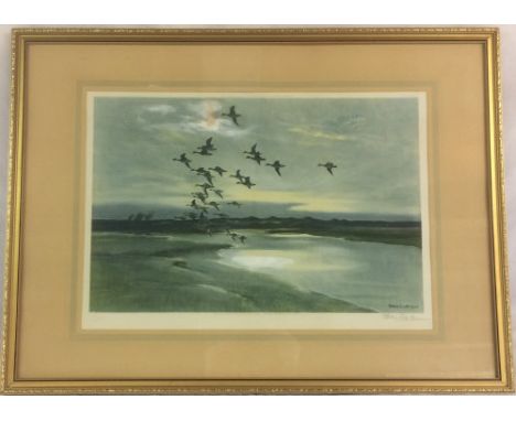 Framed print 'Wigeons beyond the dunes' signed in pencil by the artist Peter Scott. Mark to top of picture 79cm bx 59cm