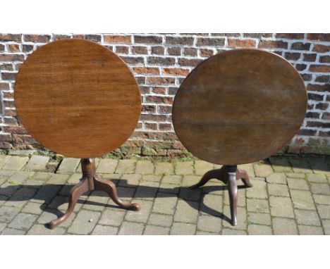 2 Georgian tilt top tables on tripod pedastals