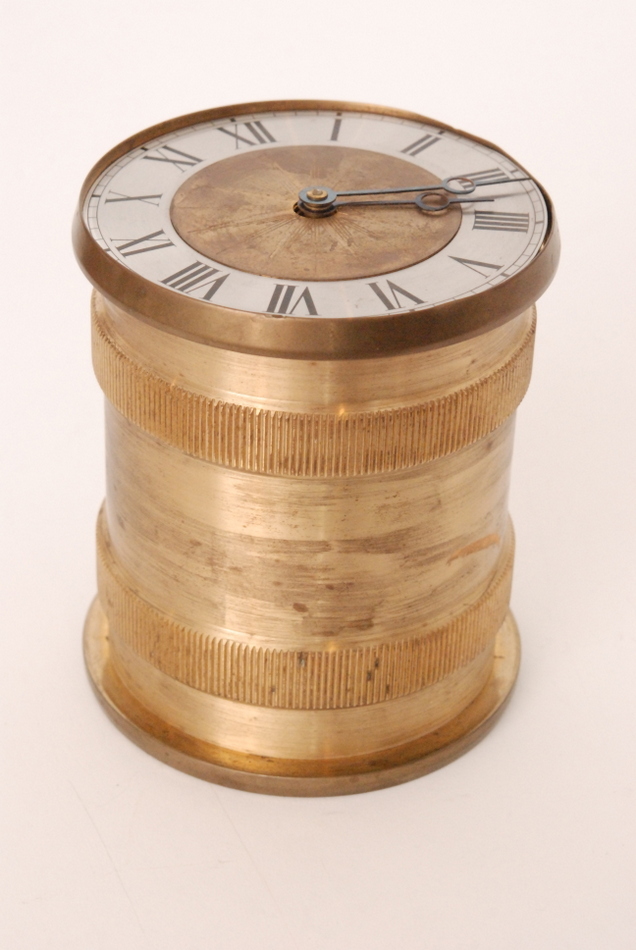 A late 20th Century barrel shaped gravity incline clock in the manner