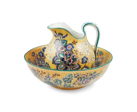 AN UNUSUAL WEMYSS WARE EWER AND BASIN EARLY 20TH CENTURY painted with various flowers and foliage on a mottled yellow ground,