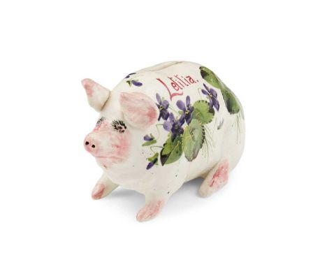 A RARE WEMYSS WARE MONEY BOX PIG 'VIOLETS' PATTERN, EARLY 20TH CENTURY inscribed 'Letitia', painted WemyssDimensions:16.5cm l