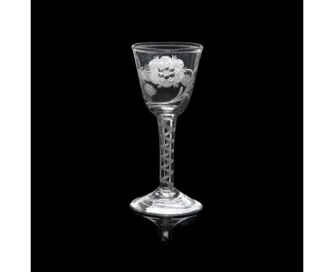 A LARGE 18TH CENTURY JACOBITE WINE GLASS  the deep round funnel bowl engraved with a displayed rose head flanked by open bud 