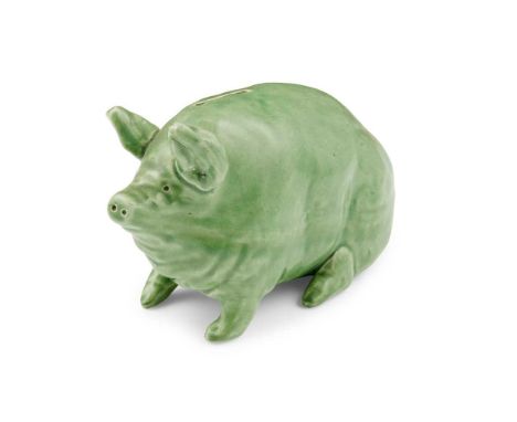 A WEMYSS WARE MONEY BOX PIG CIRCA 1900 with a green glaze, impressed WEMYSSDimensions:16cm long