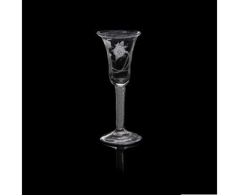 A MID / LATE 18TH-CENTURY JACOBITE ENAMEL TWIST STEM WINE GLASS  the drawn trumpet bowl engraved with trailing displayed rose