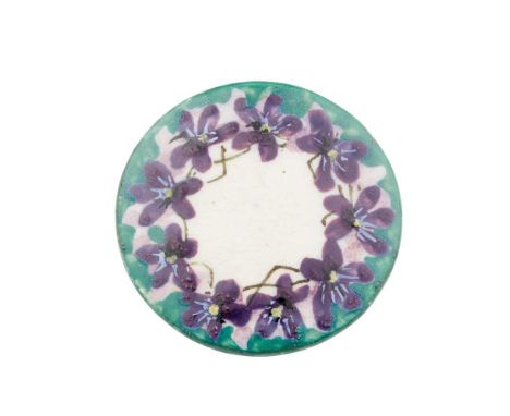 A WEMYSS WARE BUTTON CIRCA 1900 with a painted border of violets and a green rim, impressed WEMYSSDimensions:3.1cm diameter