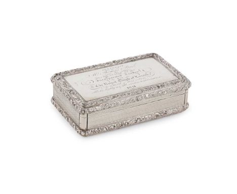 A GEORGE III PRESENTATION SNUFF BOX JOHN SHAW BIRMINGHAM 1820 of rectangular outline, with an embossed shell and floral borde