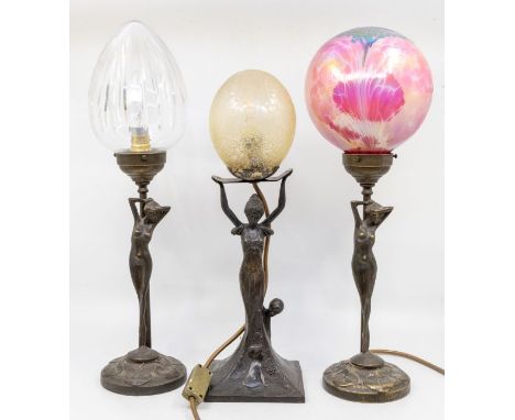 Three early to mid 20th Century Art Deco table lamps with lady figure detail, glass shades