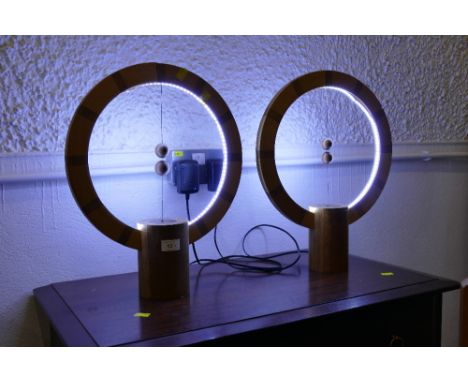 Pair of wooden modern table lamps with LED lighting and magnetic centre pieces