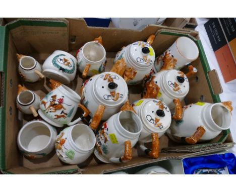 Box of ceramic hunting scene fox formed teapots, milk jugs, sugar bowls etc