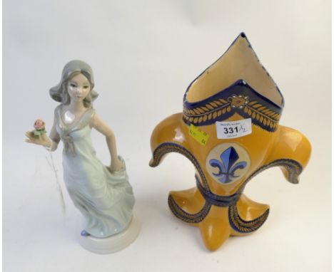 Quimper porcelain fleur de lis formed vessel and a Spanish porcelain figurine