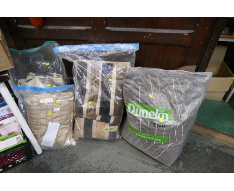 Quantity of patterned curtains and matching cushions