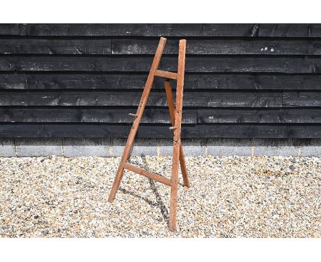 A vintage stained pine folding easel to/w a pair of Regency style chairs a/f (3)