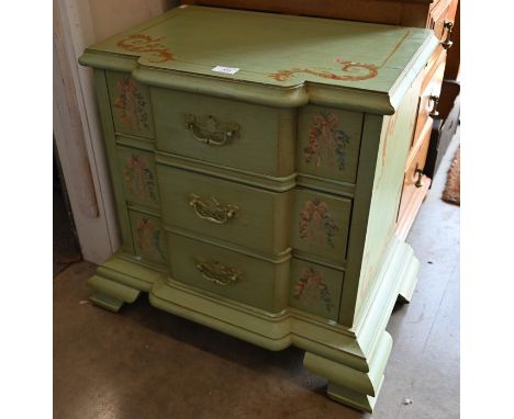 A small Continental breakfront chest of three drawers on ogee bracket feet presented in green painted finish with polychrome 