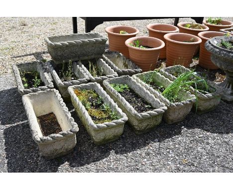 A set of ten cast stonecrete garden planter troughs (10)