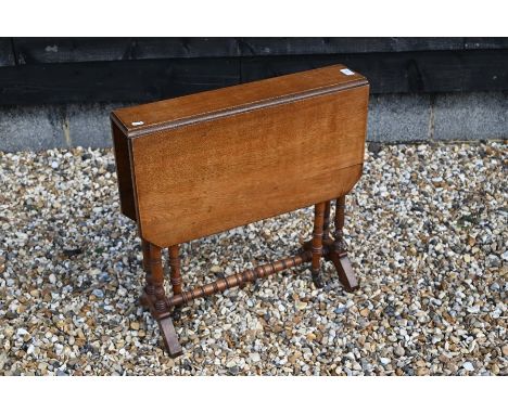 Edwardian mahogany Sutherland table with slender ring turned supports, 72 x 60 x 60 cm high overall