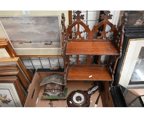 A Victorian Gothic Revival mahogany folding two-tier wall shelf, 32 cm wide to/w a Swiss cuckoo clock and an aneroid baromete