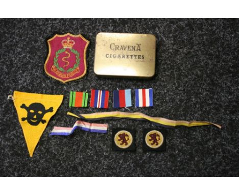 MEDAL RIBBONS & BADGES - a selection of medal ribbons and material military badges housed in a Cravena cigarette tin to inclu