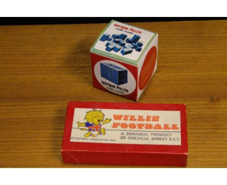 FOOTBALL GAME - a Willie Football 1965 football game (1 plastic stick a/f) and an Intrigue Puzzle Cube Game. Both include ori