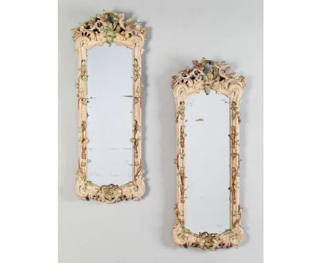 A Pair of 18th Century Painted German Rococo Girandoles  carved with high relief scrolls forming a pierced canopy, surmounted