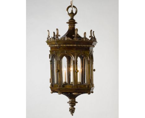 A Pair of 19th Century Renaissance Revival Bronze Hanging Lanterns  each face with a rounded arch panel surmounted by a fleur