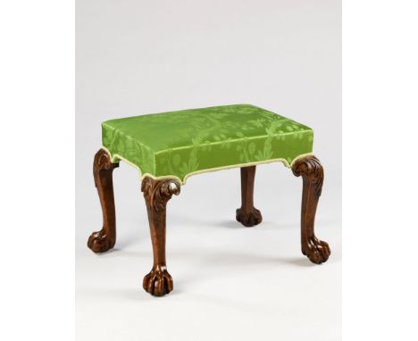 A George II Carved Walnut Stool  the square cabriole legs carved at the knees with acanthus leaves, the seat now upholstered 
