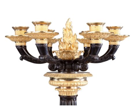 A Pair of French Empire Marble and Ormolu Candelabra  each in the form of a fluted column supported by boldly modelled gilt b